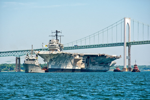USNS Apache towing the USS Forrestal CVA 59 out of the East Passage of Narragansett Bay.