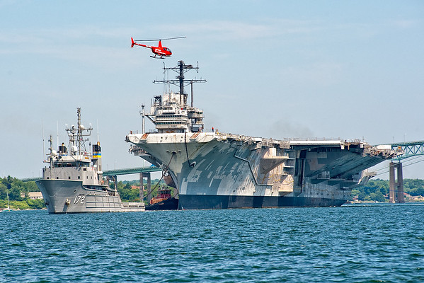 USNS Apache towing the USS Forrestal CVA 59 out of the East Passage of Narragansett Bay.