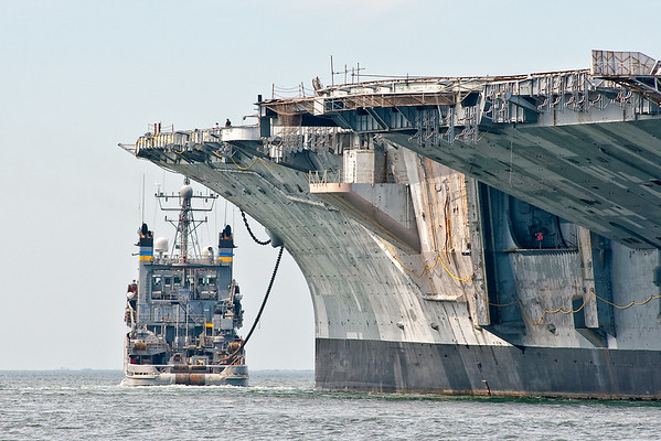 USNS Apache towing the USS Forrestal CVA 59 out of the East Passage of Narragansett Bay.