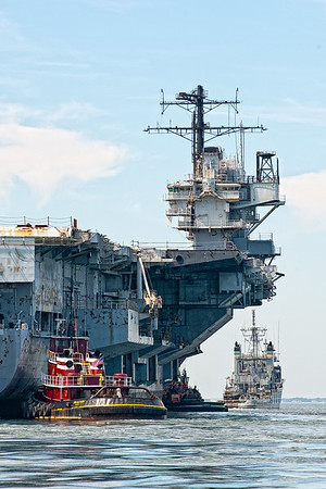 USNS Apache towing the USS Forrestal CVA 59 out of the East Passage of Narragansett Bay.